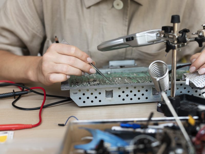 young-female-inventor-creating-her-workshop